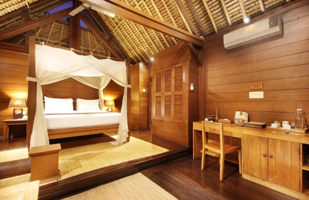 Postel nebo postele na pokoji v ubytování Tegal Sari Accommodation Ubud