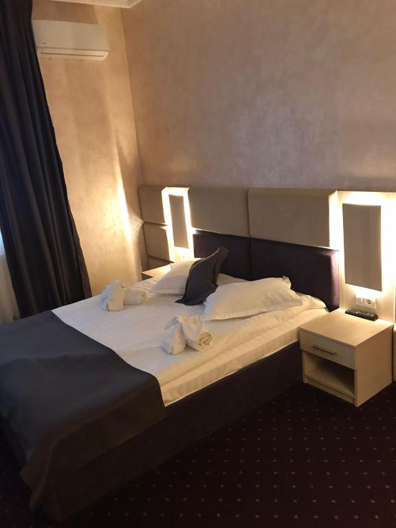 Postel nebo postele na pokoji v ubytování Le Mer