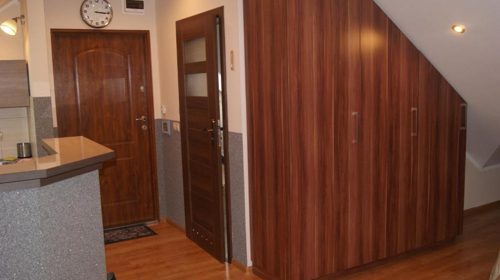 Kuchyňa alebo kuchynka v ubytovaní Apartamenty by Hanna