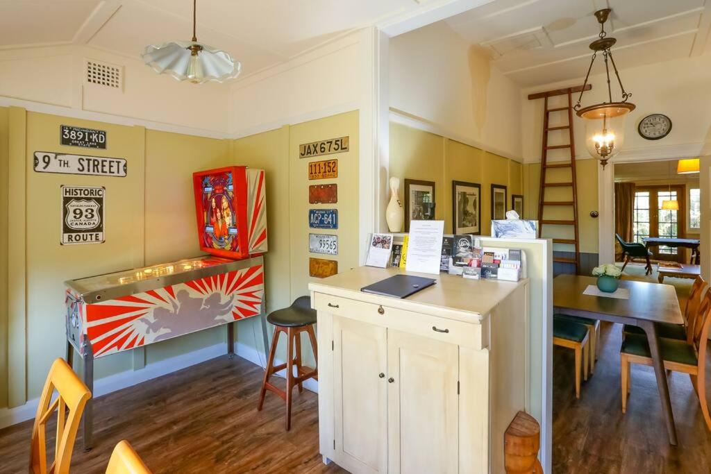 a room with a counter and a fish tank at The Gables - Circa 1880 - Classic Bowral Property in Bowral