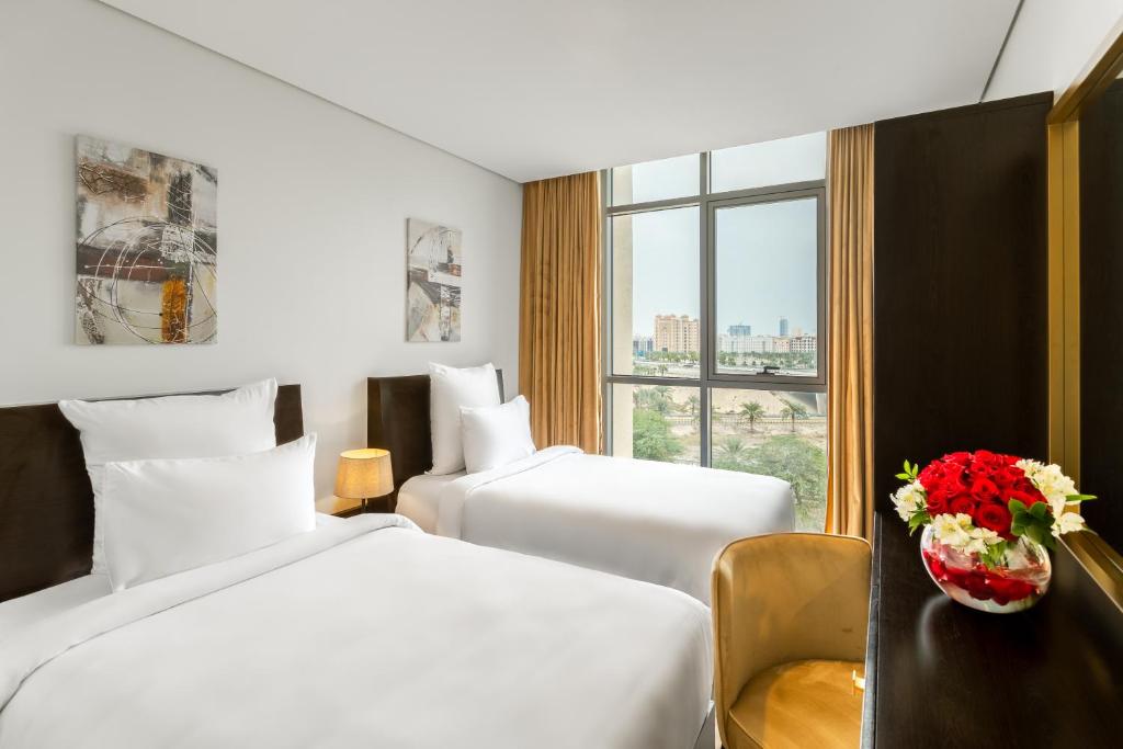 Postel nebo postele na pokoji v ubytování Mirot Hotel