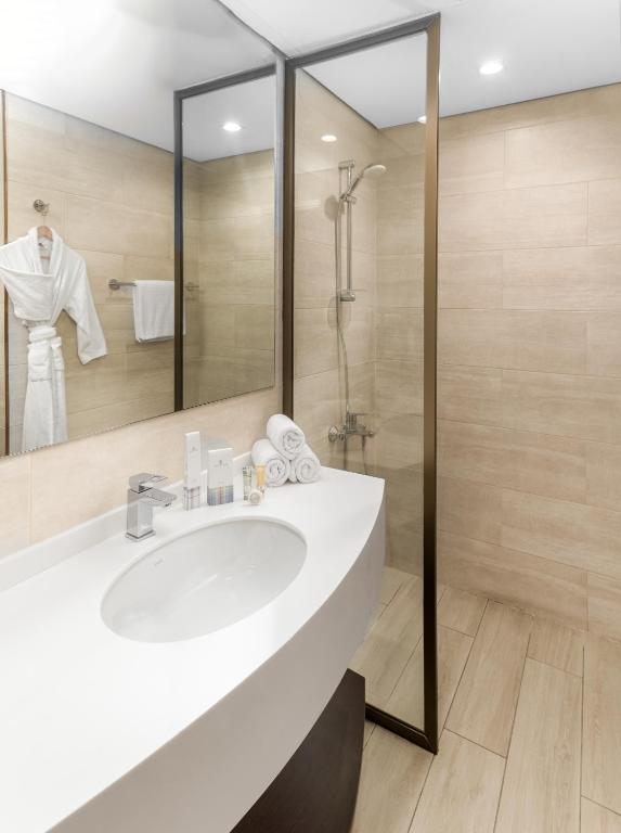 Koupelna v ubytování Mirot Hotel