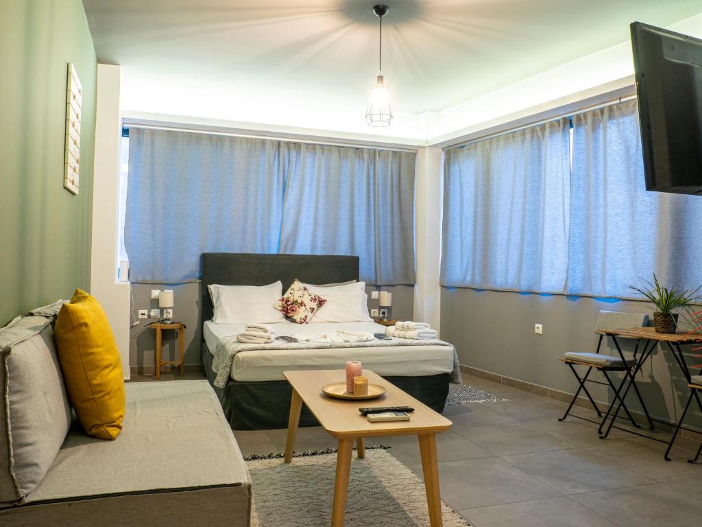 Luxury apartment ATG Acropolis tesisinde bir odada yatak veya yataklar