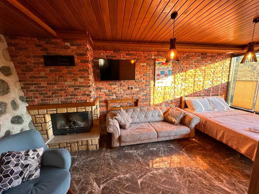 Postel nebo postele na pokoji v ubytování Falez Cafe&Restaurant&Pansiyon-Arhavi