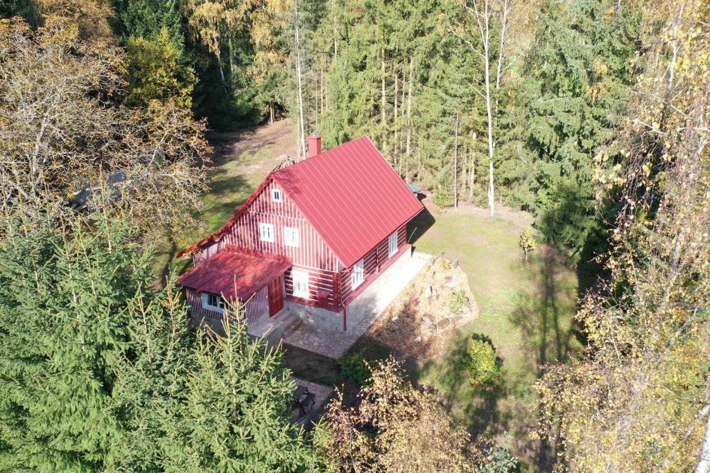an aerial view of a house with a red roof at Cottage Janovice in Rudník