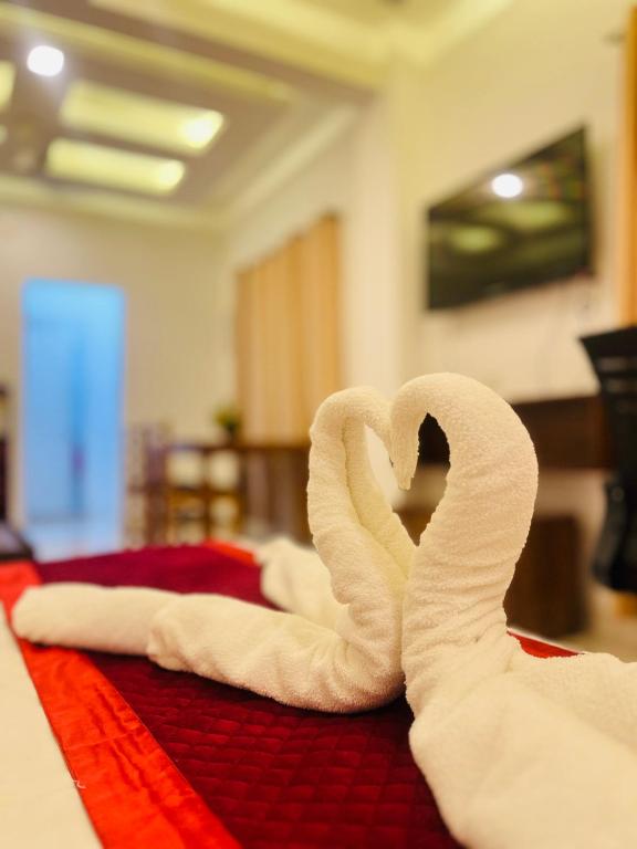 Postel nebo postele na pokoji v ubytování Dana Residency by D2v