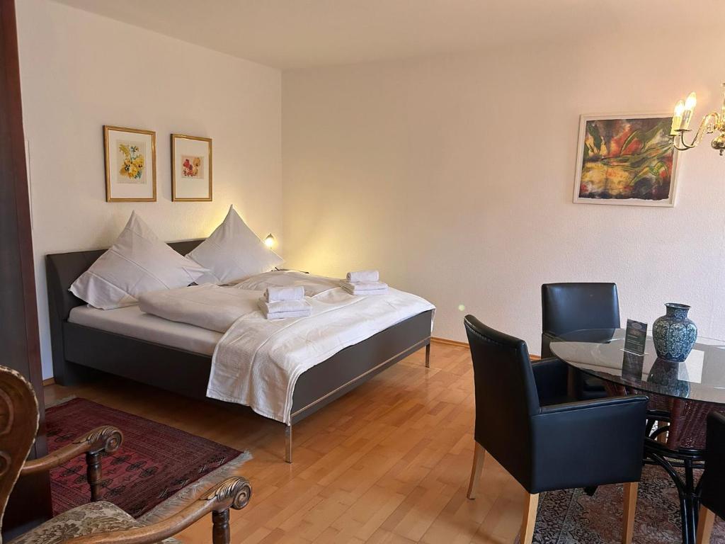 Postel nebo postele na pokoji v ubytování Kutscherhaus I