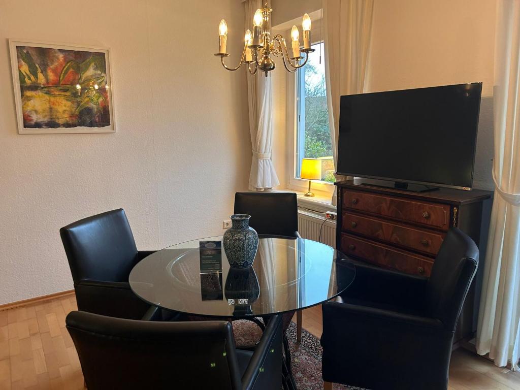 TV a/nebo společenská místnost v ubytování Kutscherhaus I