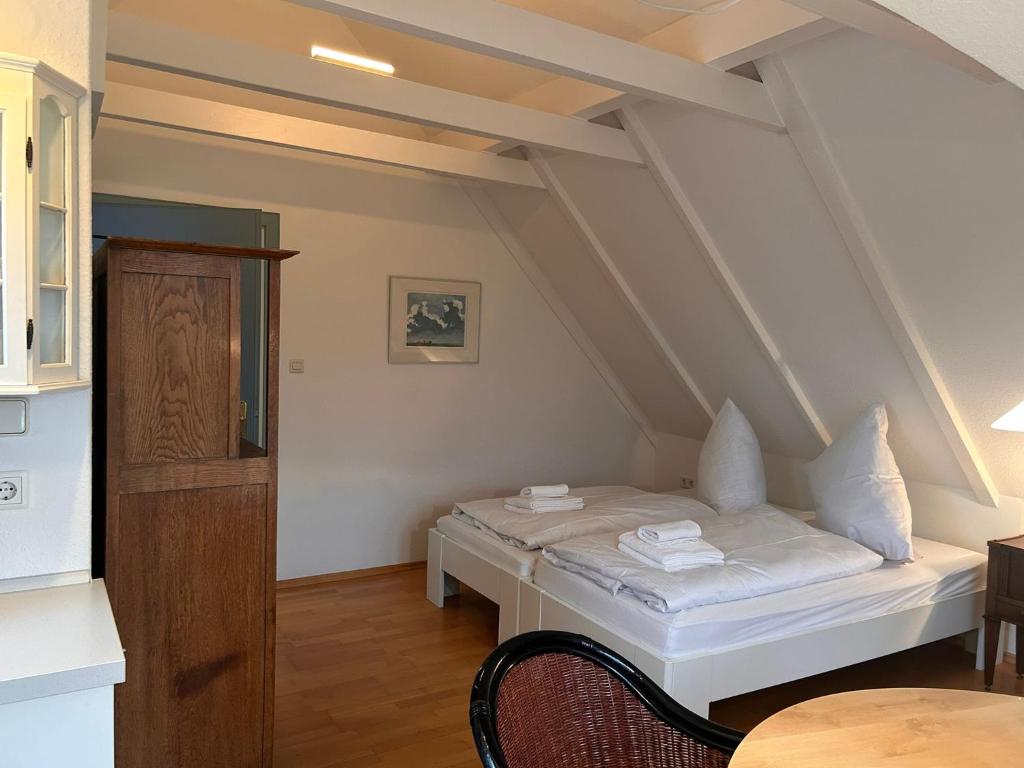 Postel nebo postele na pokoji v ubytování Kutscherhaus II