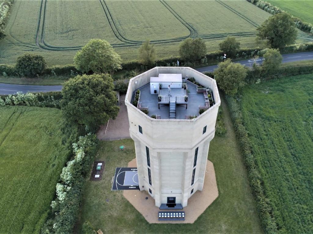 an aerial view of a large building in a field at 9 Bed in Woolverstone 62352 in Freston