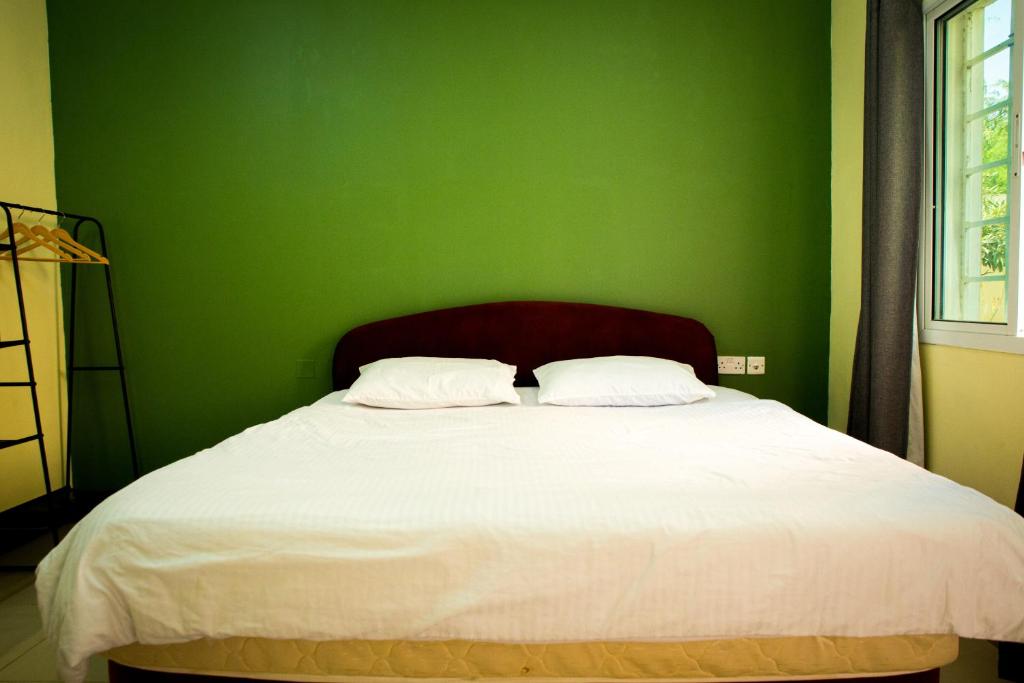 Postel nebo postele na pokoji v ubytování Nima guest house
