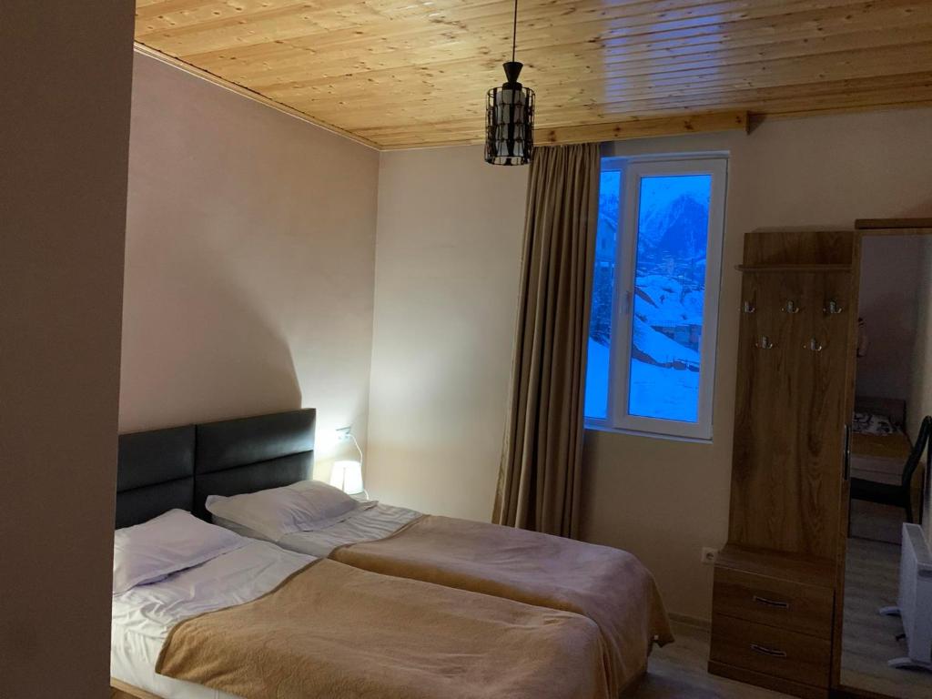 Postel nebo postele na pokoji v ubytování Tetne Qor Guesthouse