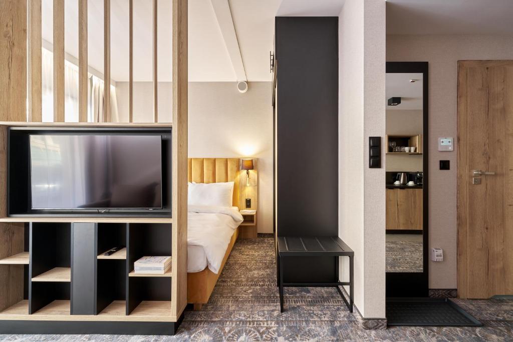 TV a/nebo společenská místnost v ubytování Złoty Horyzont Hotel & Resort Szklarska Poręba