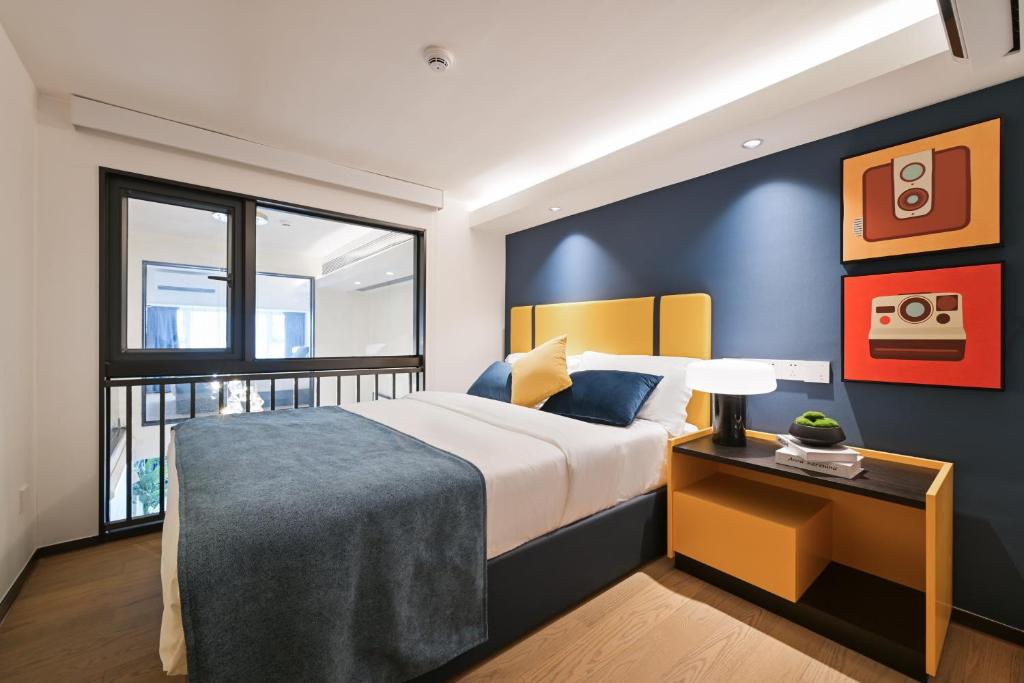 Postel nebo postele na pokoji v ubytování Livetour Hotel HaiZhu YiJing Road Metro Guangzhou