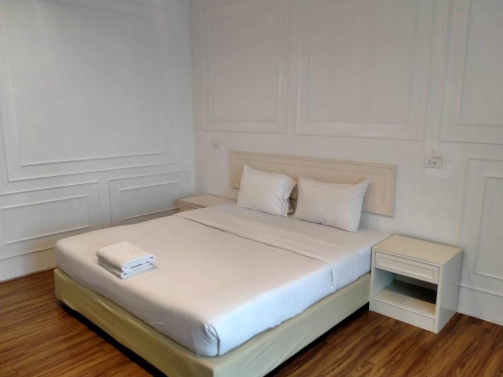 Кровать или кровати в номере Golden Dragon Resort