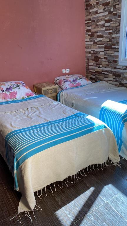 Postel nebo postele na pokoji v ubytování Ocean View Room