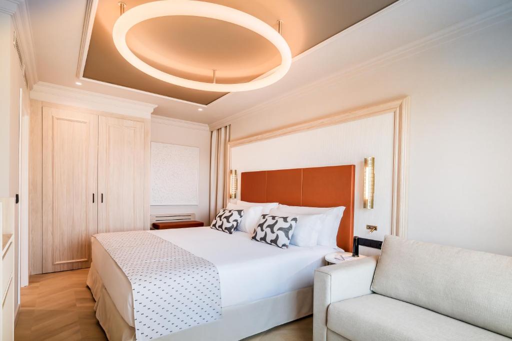 Llit o llits en una habitació de Barceló Carmen Granada