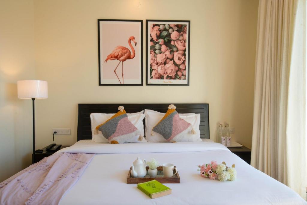 Postel nebo postele na pokoji v ubytování PerfectStayz Shimla