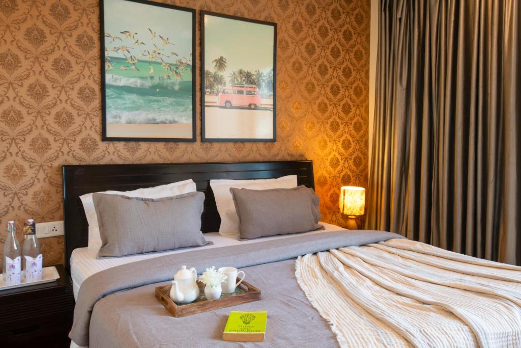 Postel nebo postele na pokoji v ubytování PerfectStayz Shimla