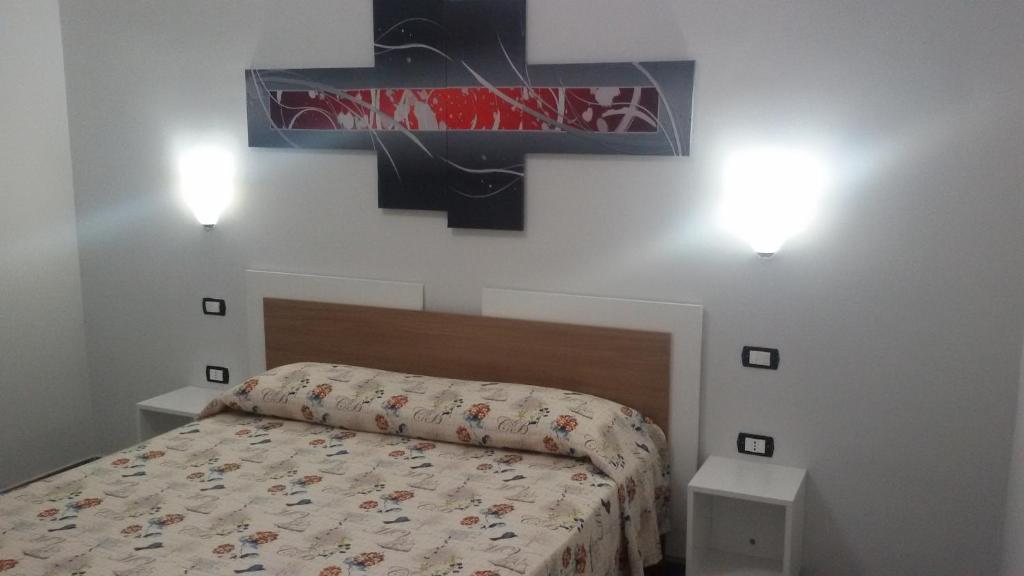 Postel nebo postele na pokoji v ubytování B&B HF Fiorella
