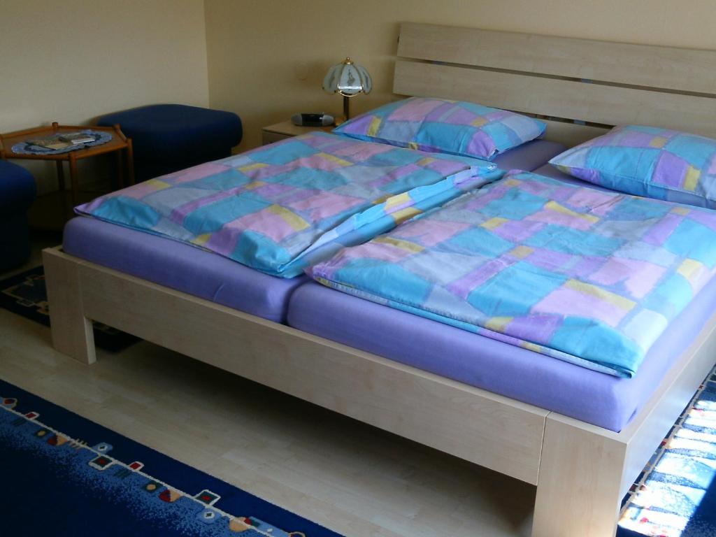 Postel nebo postele na pokoji v ubytování Gästehaus Maria