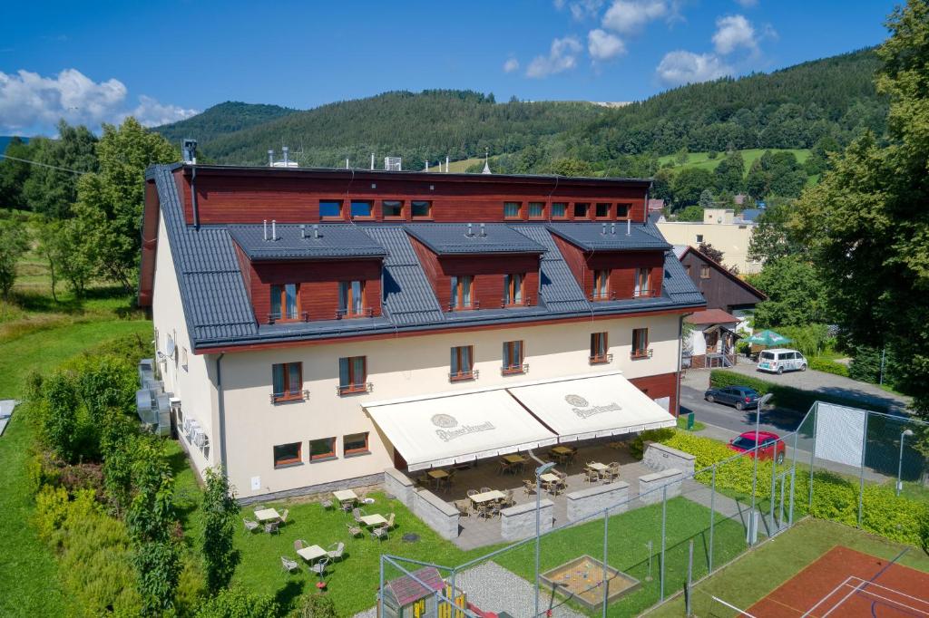an overhead view of a large building with a courtyard at Hotel Toč in Lipova Lazne