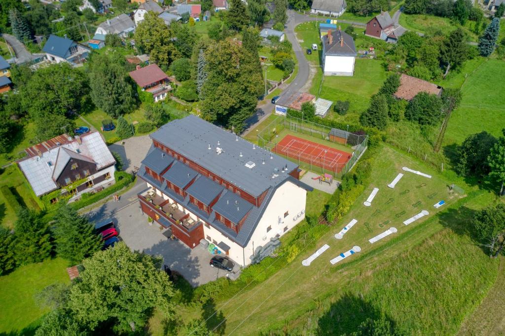 an overhead view of a large building with a red roof at Hotel Toč in Lipova Lazne