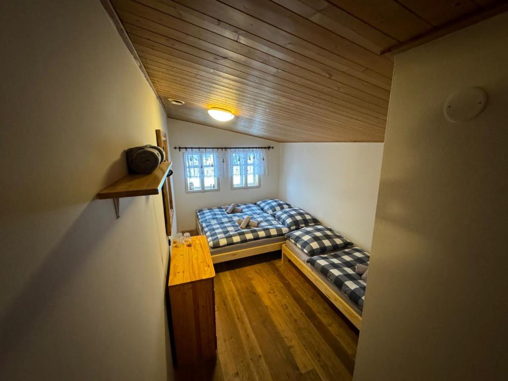 Postel nebo postele na pokoji v ubytování Chalupa Hejmovka