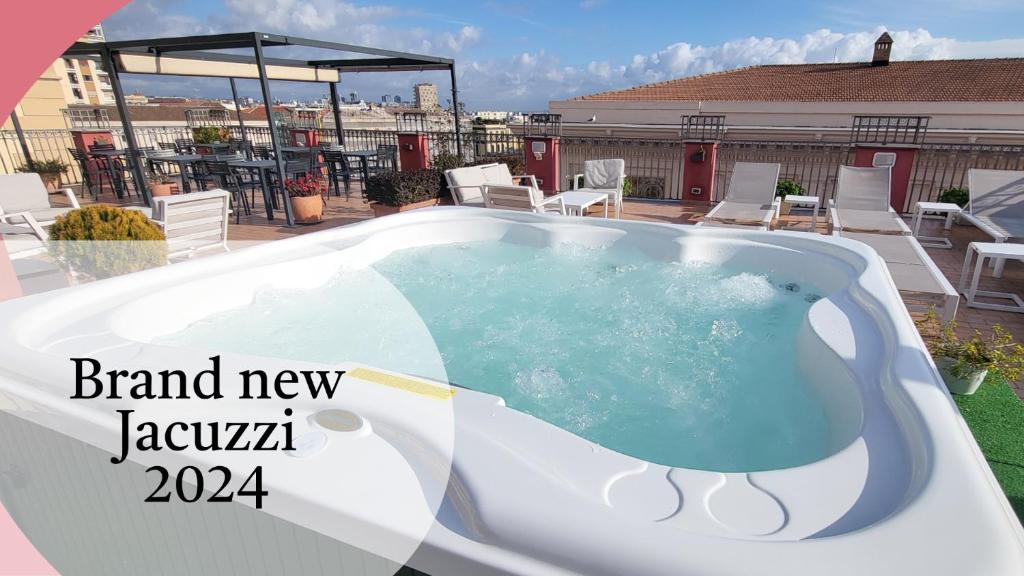 a swimming pool on the roof of a house at La Ciliegina Lifestyle Hotel in Naples