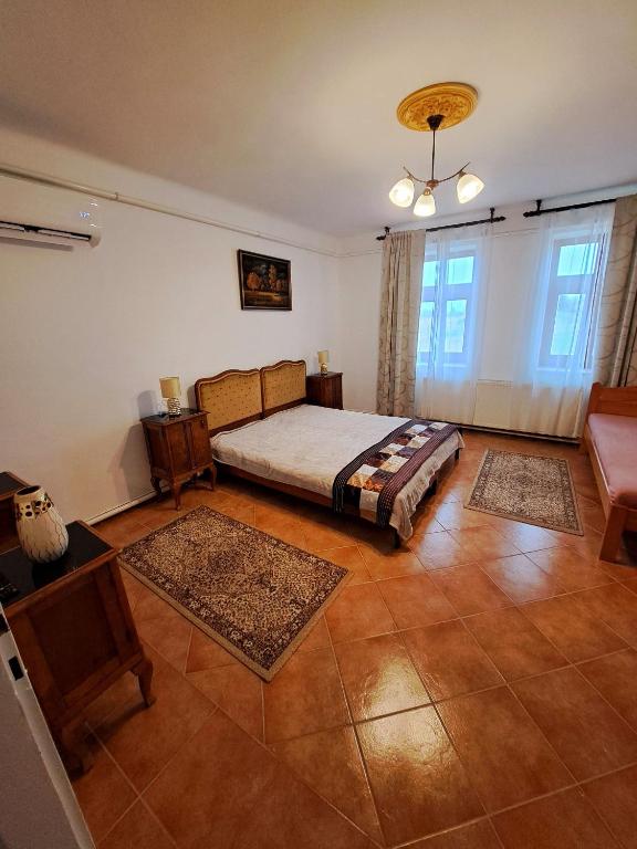 Postel nebo postele na pokoji v ubytování Csodarét Kúria