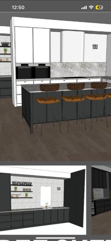 a rendering of a kitchen with a table and chairs at Kucha in Pale