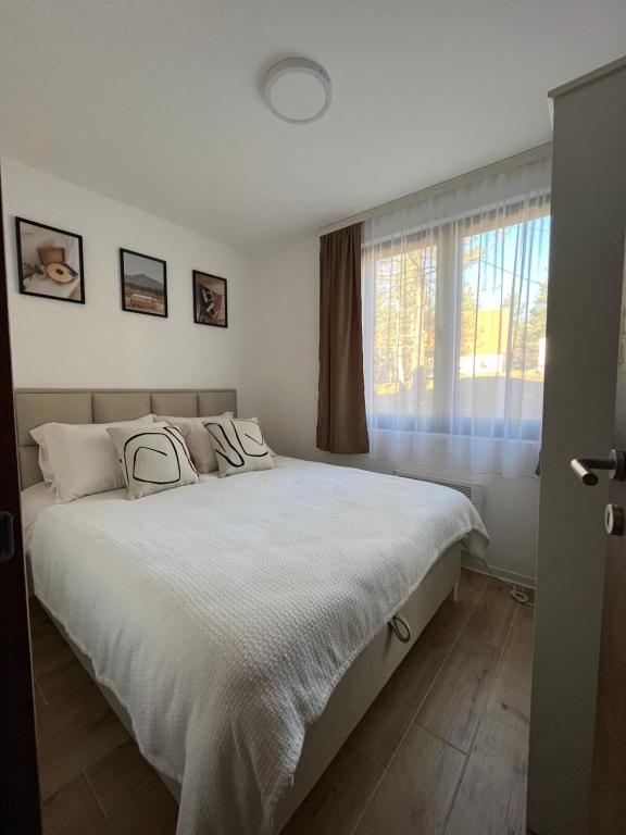 Ένα ή περισσότερα κρεβάτια σε δωμάτιο στο Pino Divčibare