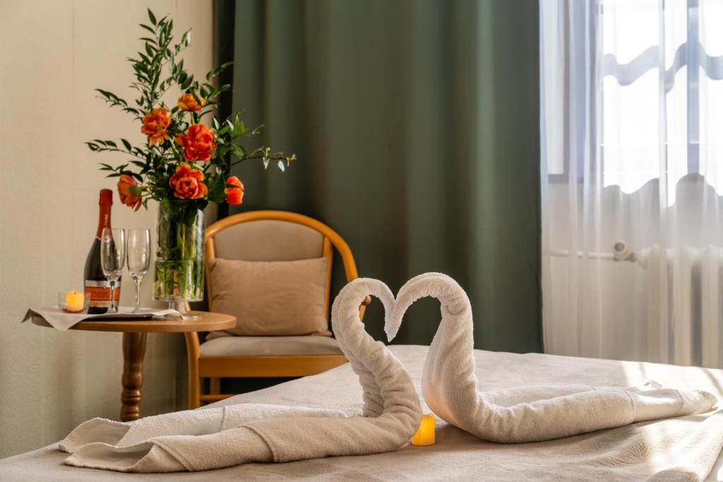 Postel nebo postele na pokoji v ubytování Hotel Gromada Toruń