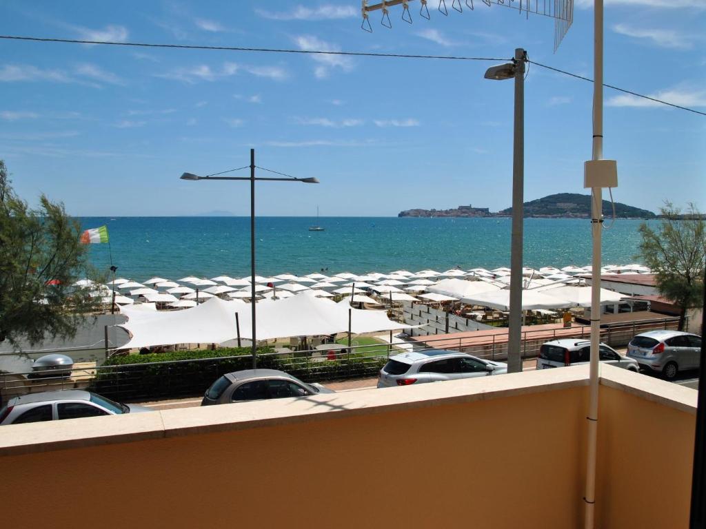 a view of the ocean from a parking lot at Apartment Brezza di Mare by Interhome in Formia