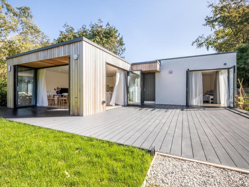 a modern house with a deck at 2 Bed in Croyde 76783 in Croyde