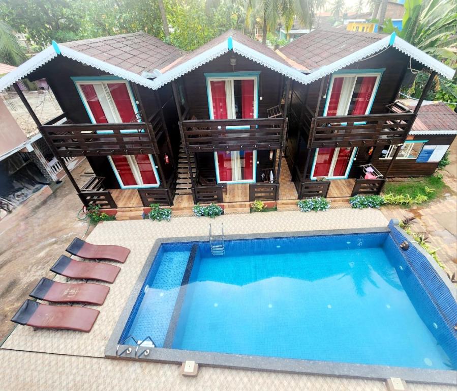 Bazén v ubytování Obrigado Cottages nebo v jeho okolí