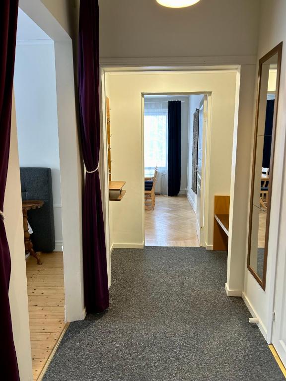 TV a/nebo společenská místnost v ubytování Skultuna Hotell & Konferens