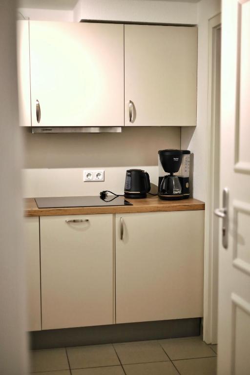Kuchyň nebo kuchyňský kout v ubytování Pößnecker Werkstätten - Alte Bäckerei