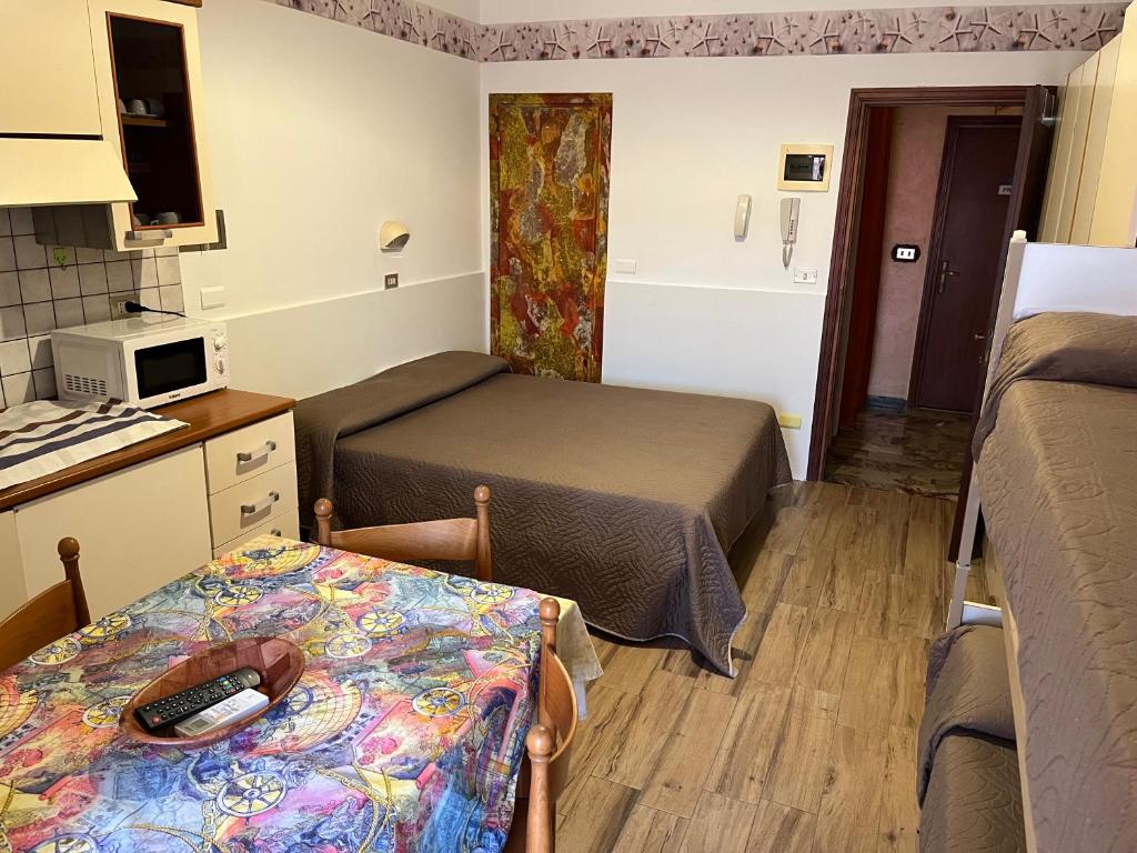 Kuchyň nebo kuchyňský kout v ubytování Hotel Wega