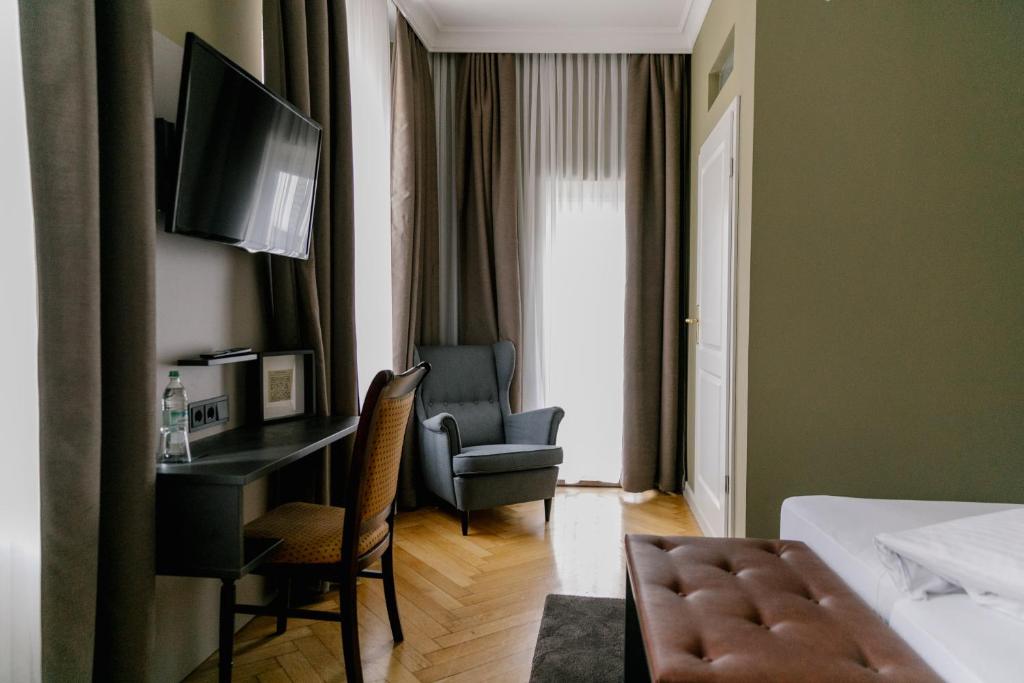 TV a/nebo společenská místnost v ubytování Hotel Fletzinger