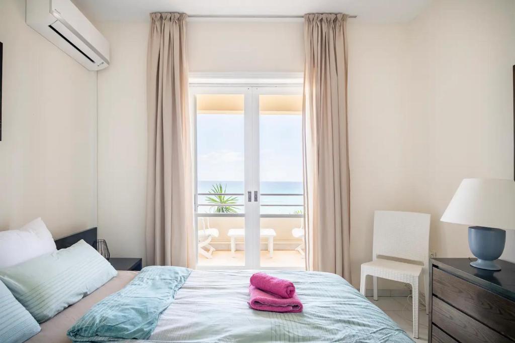 A bed or beds in a room at Agapi mou
