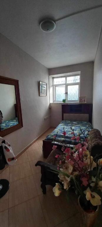 Postel nebo postele na pokoji v ubytování Vythee Residence