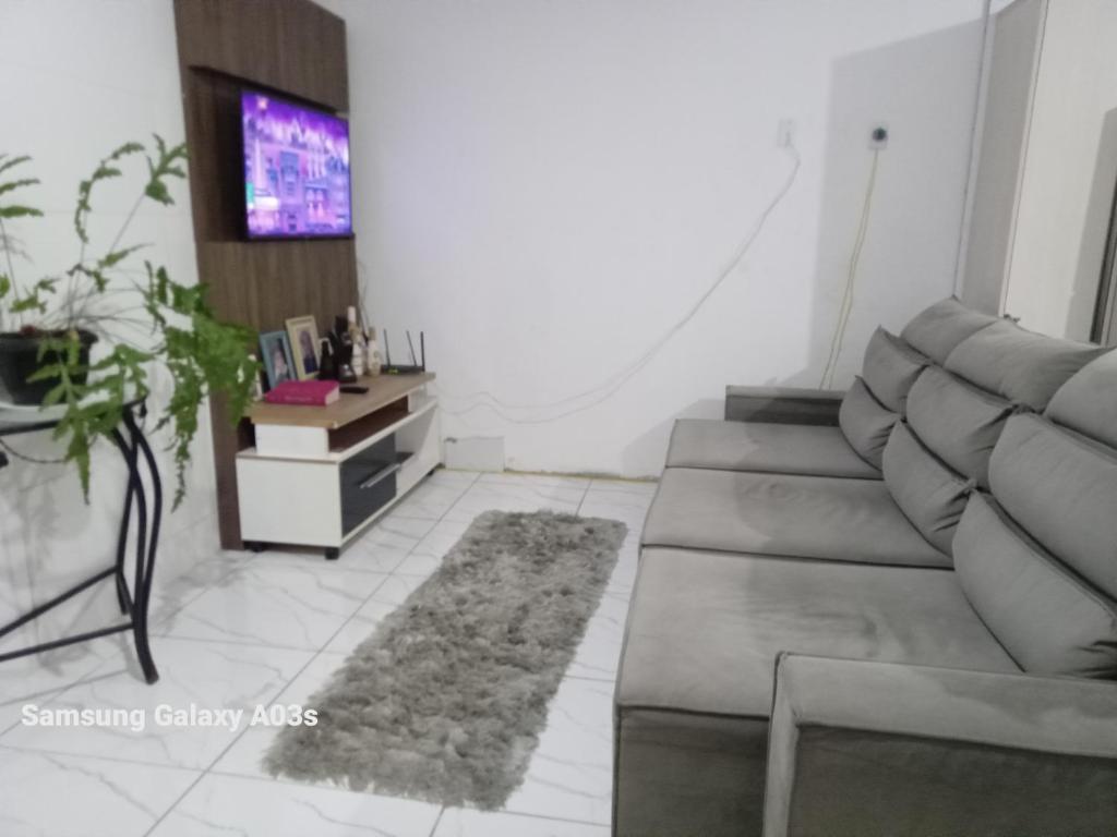 Χώρος καθιστικού στο Casa de fácil acesso 1a2km da prai