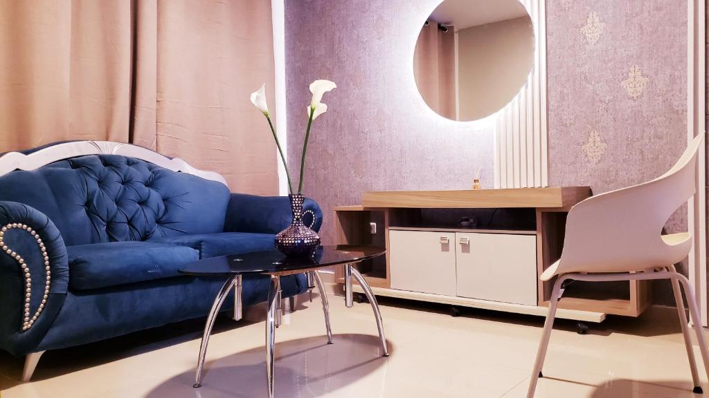 Posezení v ubytování Hotel Suite Center Pereira