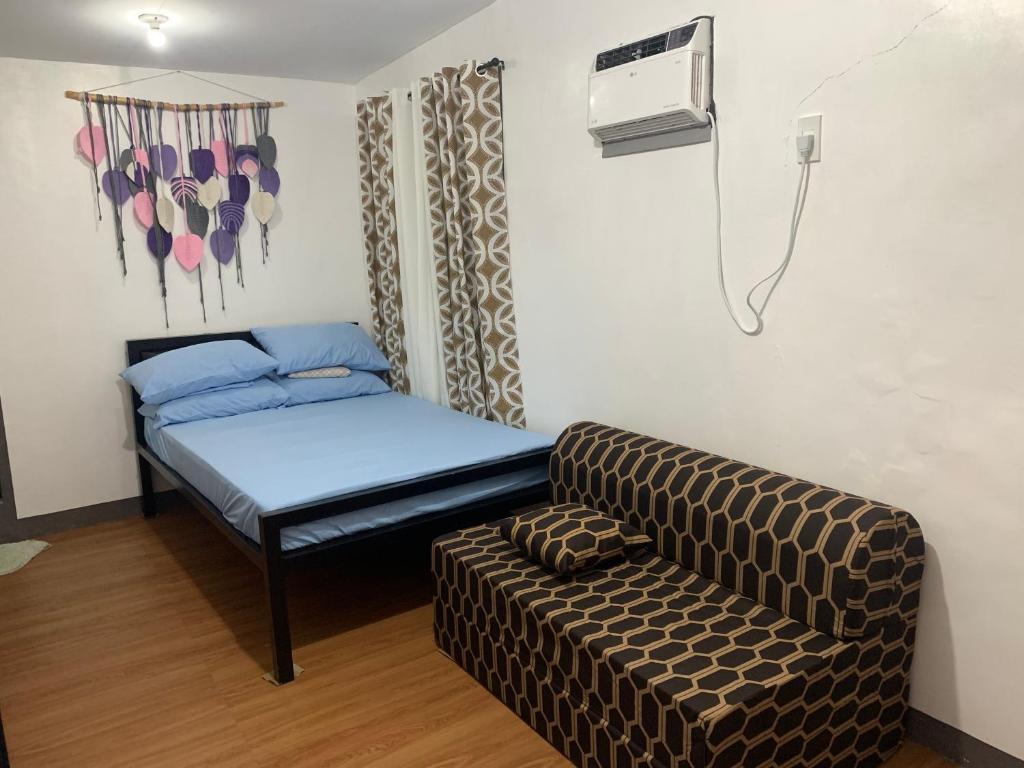 Postel nebo postele na pokoji v ubytování Capaclan Centro Private Room
