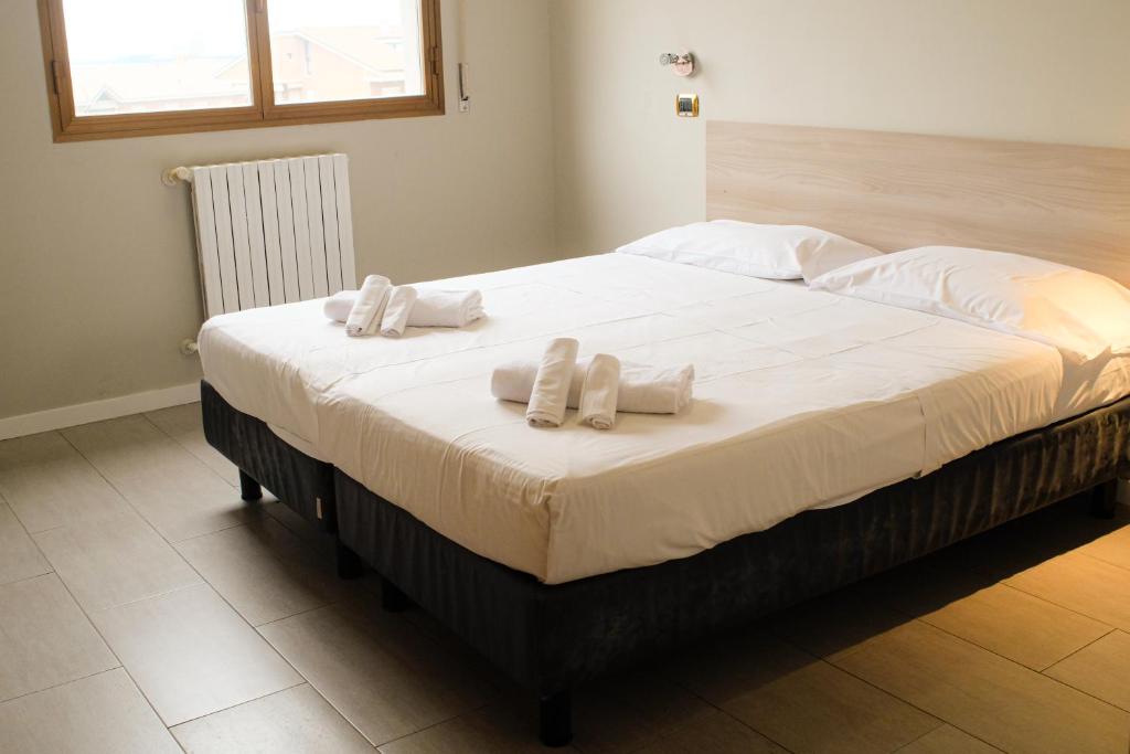 Posteľ alebo postele v izbe v ubytovaní Hp Fly Hotel Bologna