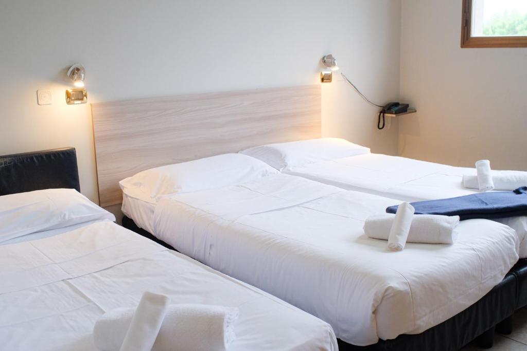 Posteľ alebo postele v izbe v ubytovaní Hp Fly Hotel Bologna