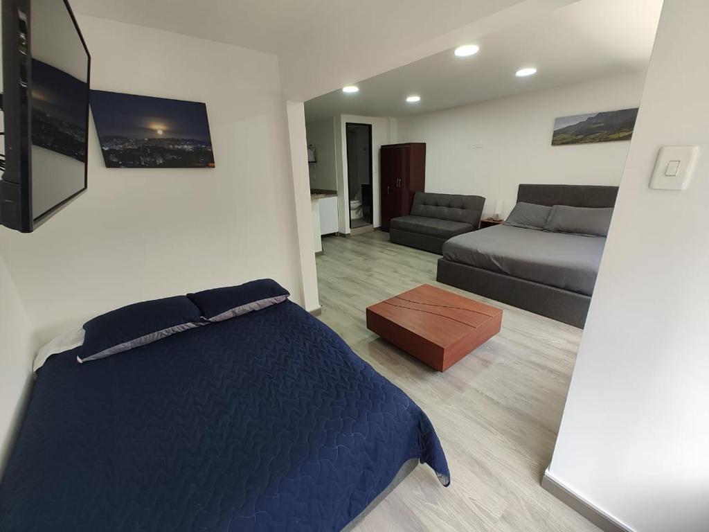 Postel nebo postele na pokoji v ubytování HOTEL SALITRE STAR