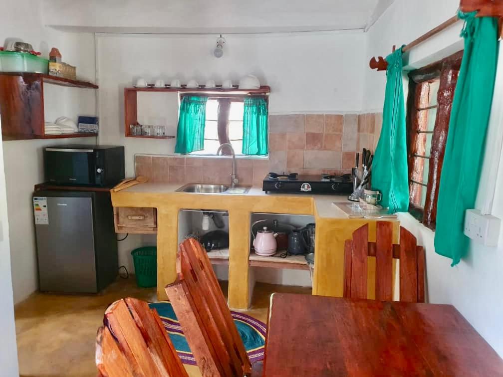Kuchyň nebo kuchyňský kout v ubytování Mustapha' s Place