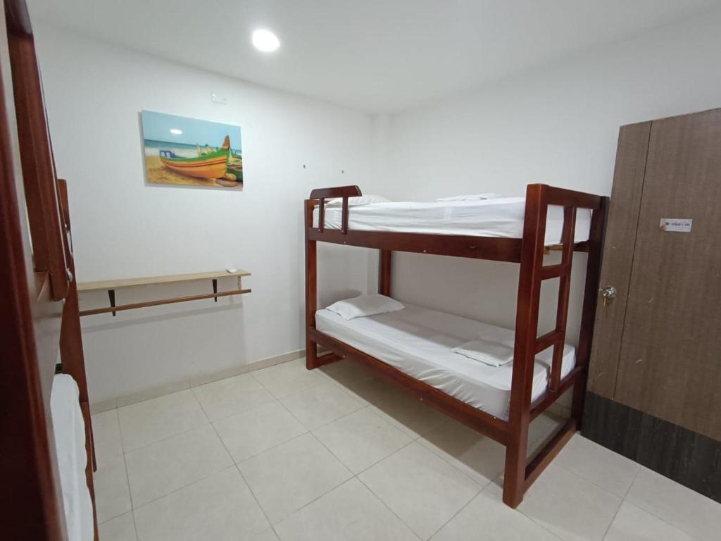 Postel nebo postele na pokoji v ubytování Cabaña la Isla-Coveñas